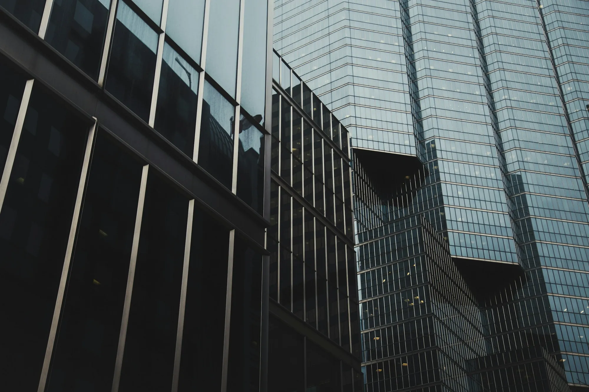 Dark glass towers seen from below